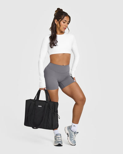 SoftMotion™ Long Sleeve Crop Top with White Logo | White