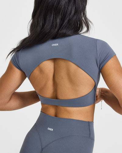 SoftMotion™ Short Sleeve Crop Top with White Logo | Granite Blue