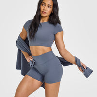 SoftMotion™ Short Sleeve Crop Top with White Logo | Granite Blue