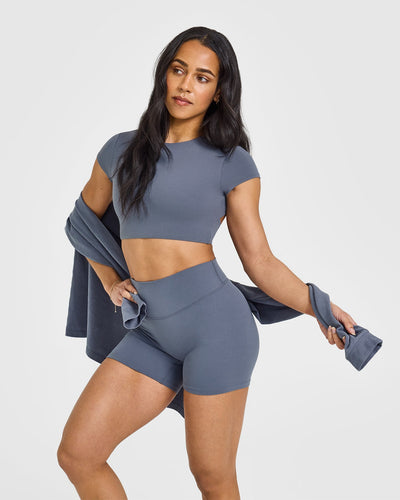 SoftMotion™ Short Sleeve Crop Top with White Logo | Granite Blue