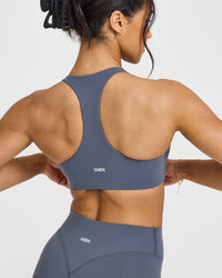 SoftMotion™ Sports Bra with White Logo | Granite Blue