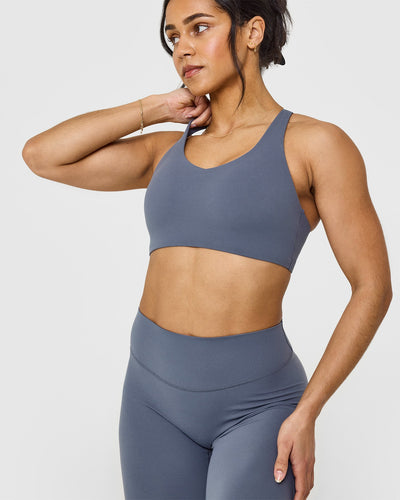 SoftMotion™ Sports Bra with White Logo | Granite Blue