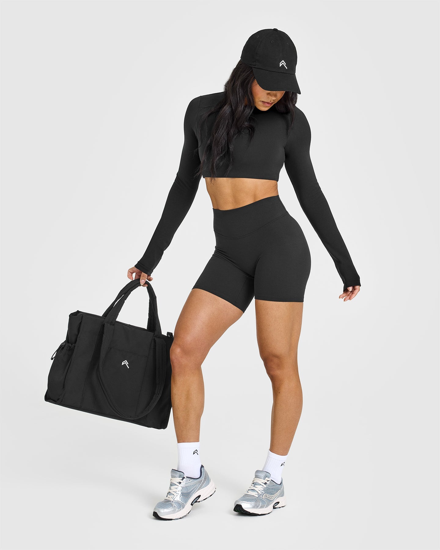 SoftMotion™ Long Sleeve Crop Top with White Logo | Soft Black