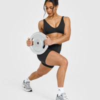 SoftMotion™ Scoop Back Bralette with White Logo | Soft Black