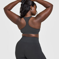Effortless Seamless Racer Back Sports Bra with White Logo | Coal