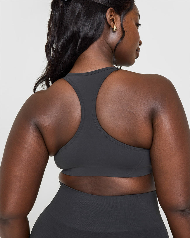 Effortless Seamless Racer Back Sports Bra with White Logo | Coal