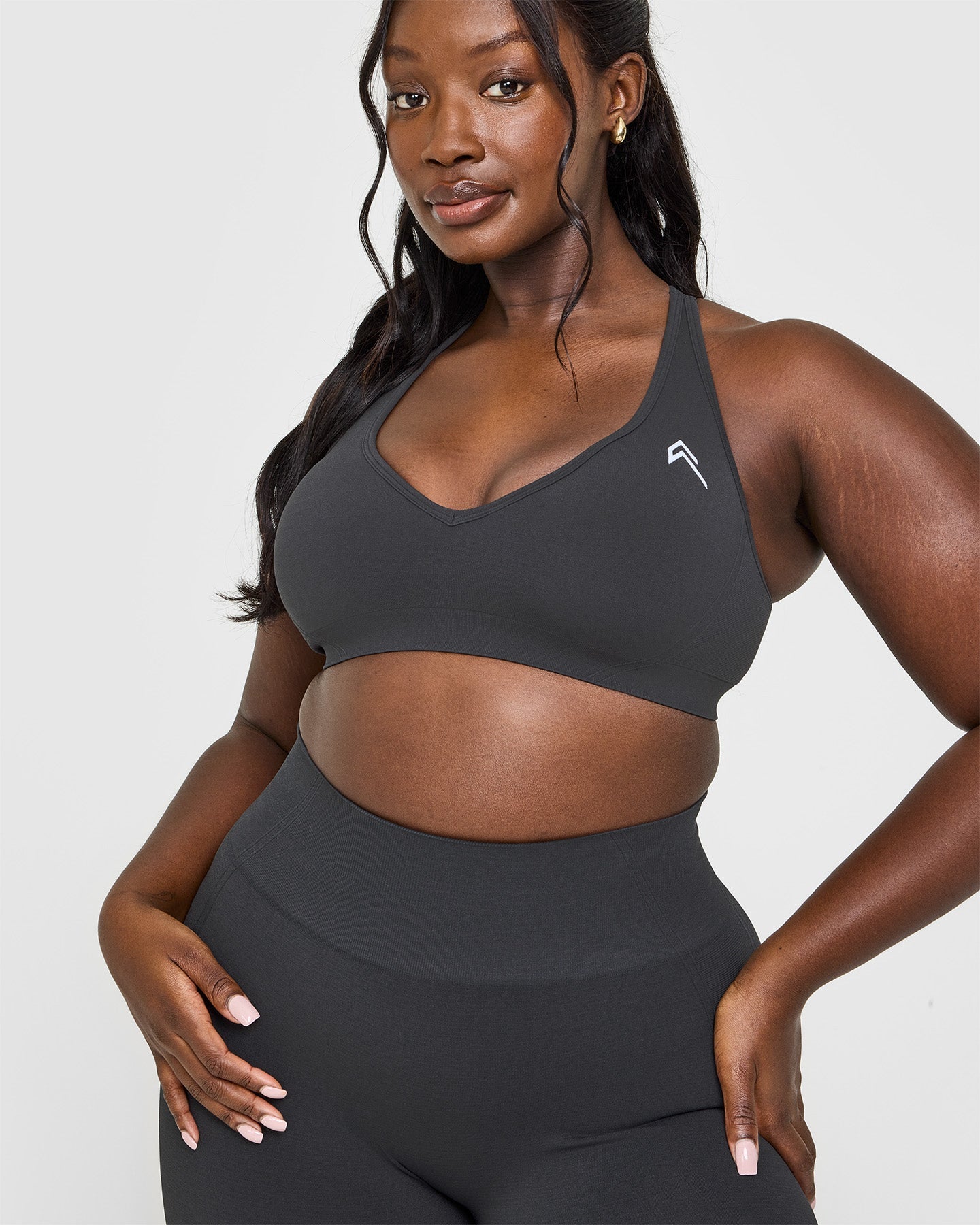 Effortless Seamless Racer Back Sports Bra with White Logo | Coal