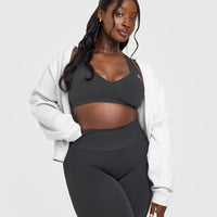 Effortless Seamless Racer Back Sports Bra with White Logo | Coal