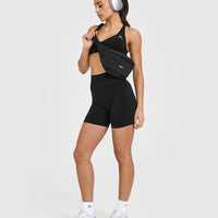 Effortless Seamless Racer Back Sports Bra with White Logo | Black