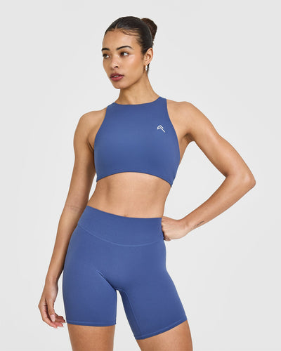 EasyLift™ High Neck Sports Bra with White Logo | Shadow Blue