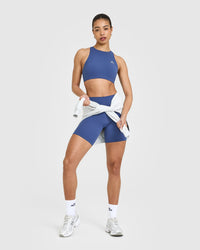 EasyLift™ High Neck Sports Bra with White Logo | Shadow Blue