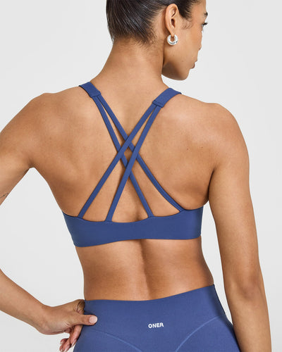 EasyLift™ High Neck Sports Bra with White Logo | Shadow Blue