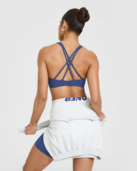 EasyLift™ High Neck Sports Bra with White Logo | Shadow Blue