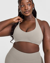 SoftMotion™ Bralette with White Logo | Warm Sand