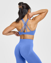 EasyLift™ High Neck Sports Bra with White Logo | Glaucous Blue