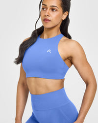 EasyLift™ High Neck Sports Bra with White Logo | Glaucous Blue