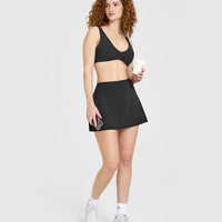 SoftMotion™ Skort with White Logo | Soft Black