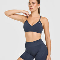 EnhanceLift™ Seamless Strappy Sports Bra with White Logo | True Blue