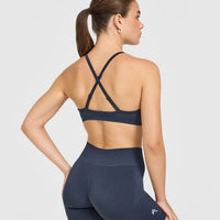 EnhanceLift™ Seamless Strappy Sports Bra with White Logo | True Blue