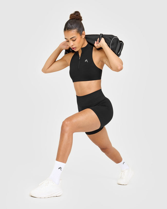 EasyLift™ Zip High Neck Sports Bra with White Logo | Black