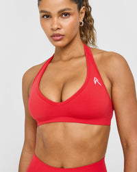 Effortless Seamless Halter Neck Sports Bra with White Logo | Muscle Mommy Red