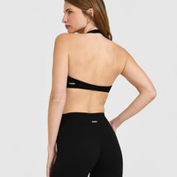 SoftMotion™ Minimal Halter Neck Bralette with White Logo | Black