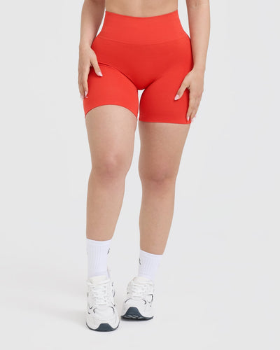 Effortless Seamless Shorts with White Logo | Charged Orange