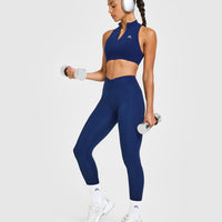 EasyLift™ Zip High Neck Sports Bra with White Logo | Midnight