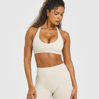 SoftMotion™ Bralette with White Logo | Sand