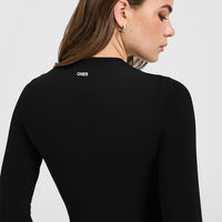 SoftMotion™ Long Sleeve Mid Top with White Logo | Black