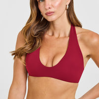 SoftMotion™ Minimal Halter Neck Bralette with White Logo | Ruby Red