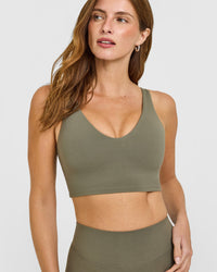 SoftMotion™ Longline Sports Bra with White Logo | Alpine Green