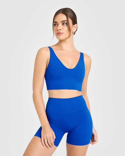Oner Modal SoftMotion™ Longline Sports Bra with White Logo | Light Cobalt Blue