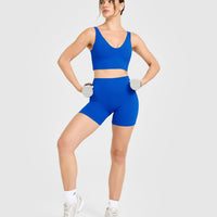 SoftMotion™ Longline Sports Bra with White Logo | Light Cobalt Blue