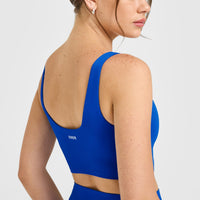 SoftMotion™ Longline Sports Bra with White Logo | Light Cobalt Blue