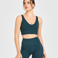 SoftMotion™ Longline Sports Bra with White Logo | Oil Blue