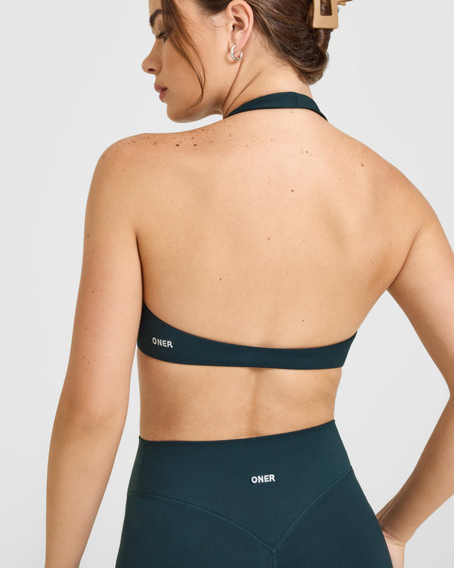 SoftMotion™ Minimal Halter Neck Bralette with White Logo | Oil Blue