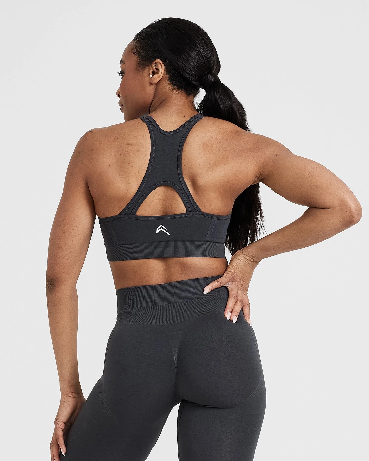 Effortless Seamless High Neck Bralette with White Logo | Coal