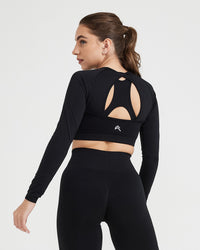 Effortless Seamless Long Sleeve Crop Top with White Logo | Black