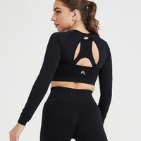 Effortless Seamless Long Sleeve Crop Top with White Logo | Black