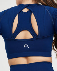 Effortless Seamless Long Sleeve Crop Top with White Logo | Midnight