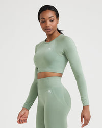 Effortless Seamless Long Sleeve Crop Top with White Logo | Sage