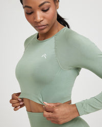 Effortless Seamless Long Sleeve Crop Top with White Logo | Sage