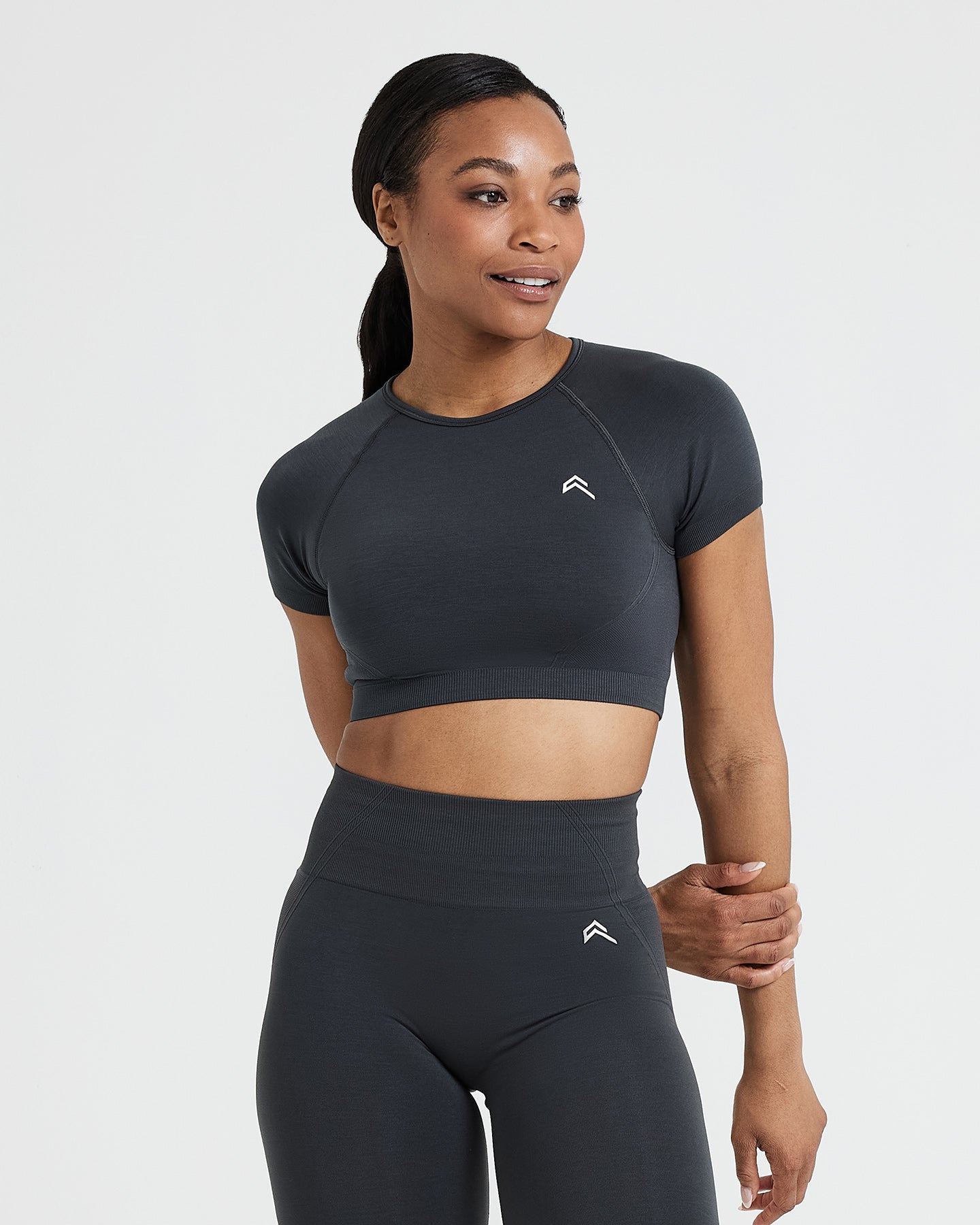 Effortless Seamless Short Sleeve Crop Top with White Logo | Coal