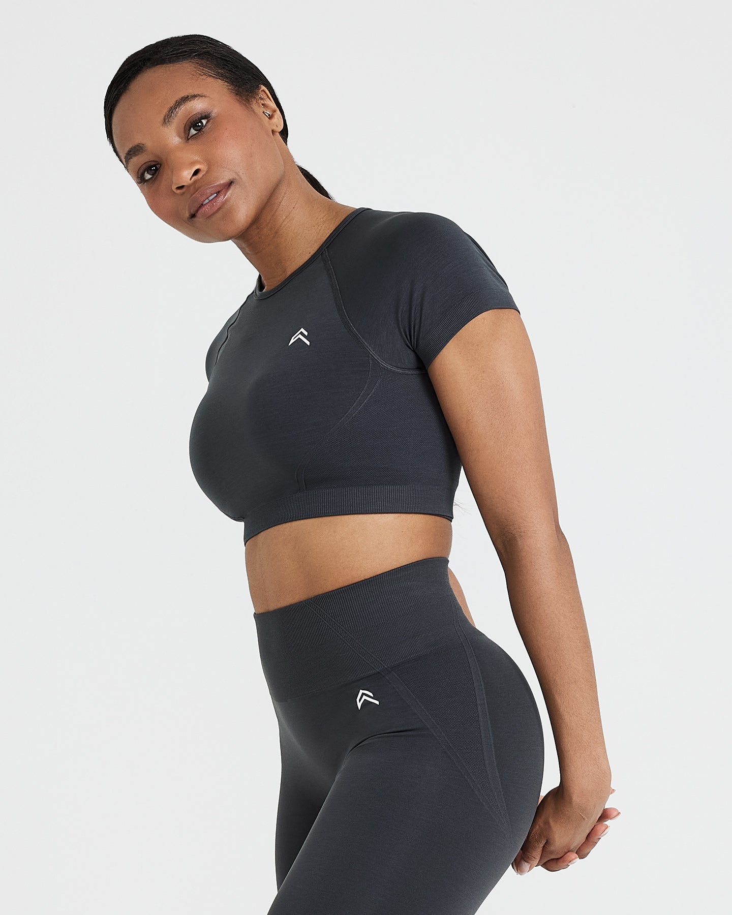 Effortless Seamless Short Sleeve Crop Top with White Logo | Coal