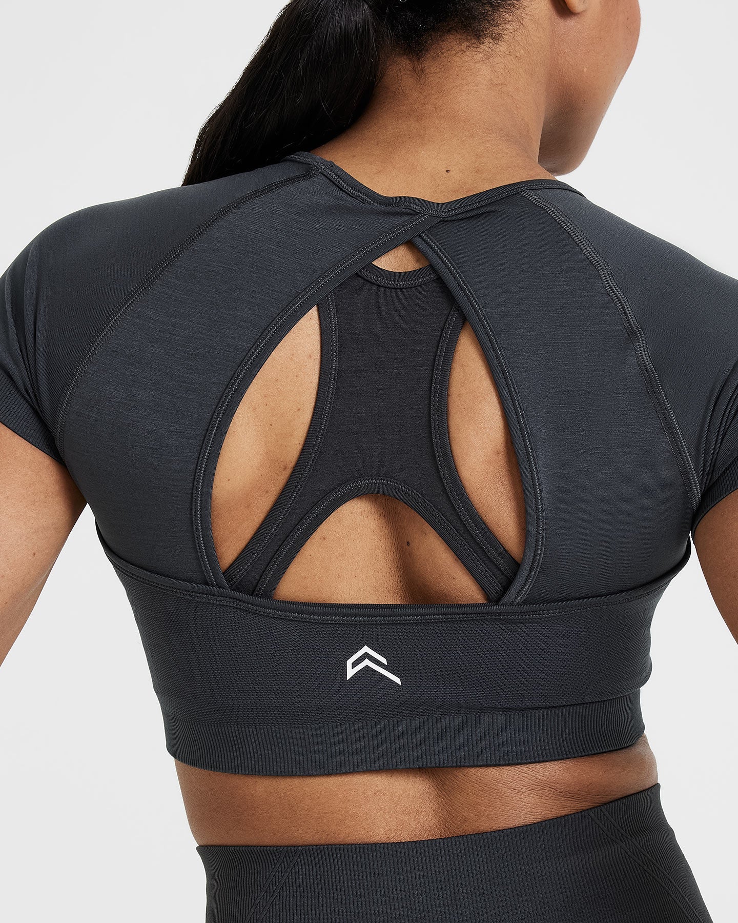 Effortless Seamless Short Sleeve Crop Top with White Logo | Coal