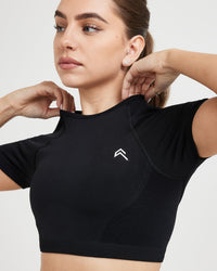 Effortless Seamless Short Sleeve Crop Top with White Logo | Black