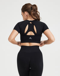 Effortless Seamless Short Sleeve Crop Top with White Logo | Black