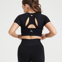 Effortless Seamless Short Sleeve Crop Top with White Logo | Black