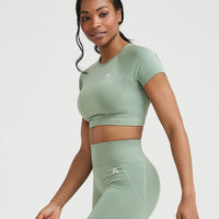 Effortless Seamless Short Sleeve Crop Top with White Logo | Sage